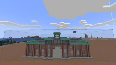 Large train station with a long roof, brick and tuff structure, industrial iron windows, metal girders, and copper roof details.
